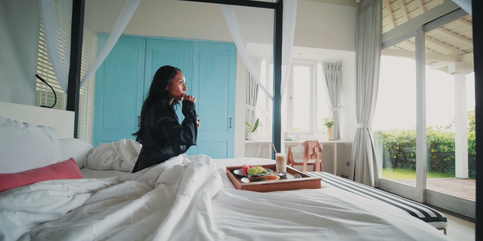 A solo traveller at Hidden Hills Villas: breakfast in bed